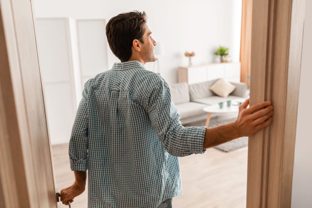 A man viewing a property.